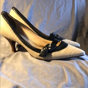 Woman’s size 6 fabric and leather heels
